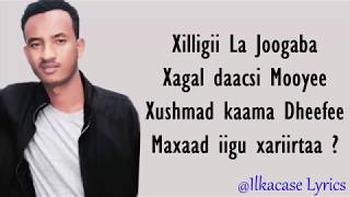 Xariir Ahmed Hees Macaan Naxli Lyrics 2018 [upl. by Yanrahs345]